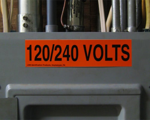 NEMA standard Voltage Markers with black text on an orange background