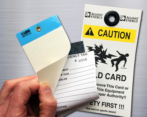 Two plastic safety tags with pre-printed informtion.