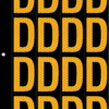 An image of a sheet of 16 retroreflective high intensity prismatic numbers & letters sized to fit in a 3-ring binder. Charaters are orange on a black background. The legend is, "D".