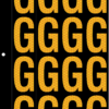 An image of a sheet of 16 retroreflective high intensity prismatic numbers & letters sized to fit in a 3-ring binder. Charaters are orange on a black background. The legend is, "G".