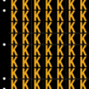 An image of a sheet of 70 retroreflective high intensity prismatic numbers & letters sized to fit in a 3-ring binder. Characters are orange on a black background. The legend is, "K".