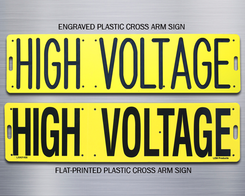 An engraved and a printed high voltage cross arm sign.