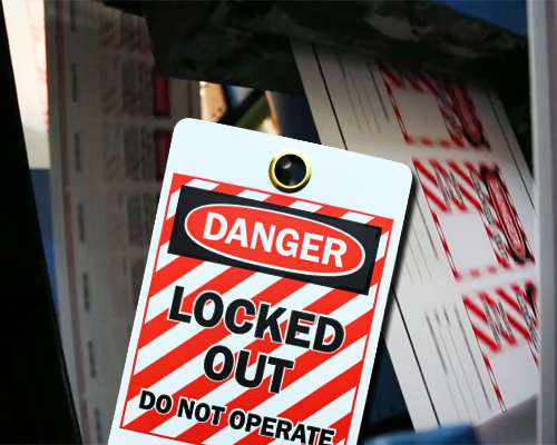 A red and black lockout tag reading, "Danger Locked Out"