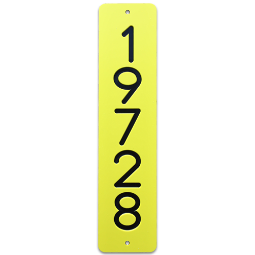 An engraved ellow and black utility pole marker with 5 numbers arranged vertically.