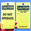 A Yellow, rectangular lockout tag showing front and back sides, reading, "Caution Do Not Operate."