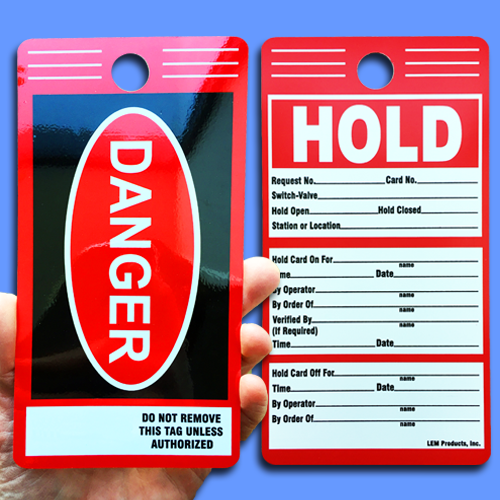 A White, Black and Red, rectangular lockout tag showing front and back sides, reading, "Danger Hold."