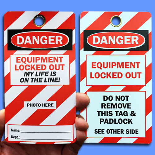 A White, Black and Red, rectangular lockout tag showing front and back sides, reading, "Danger Equipment Locked Out, My Life is on the Line."